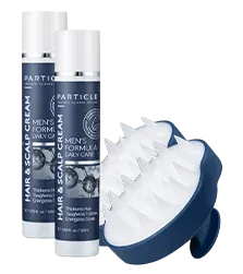 Two bottles of Particle Hair Scalp Cream and two scalp brushes standing upright.